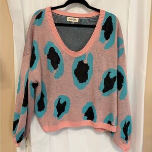 Peach Love California V-Neck Sweater in Pink and Blue